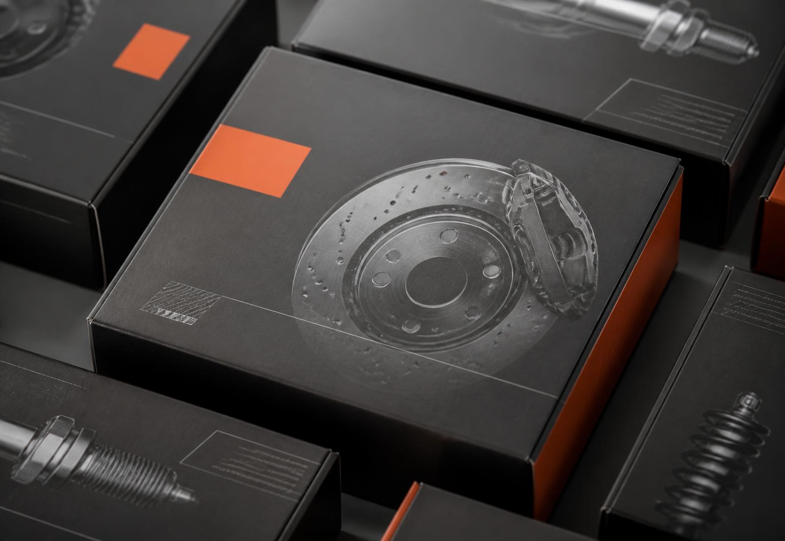Matte graphite product packaging with orange accents